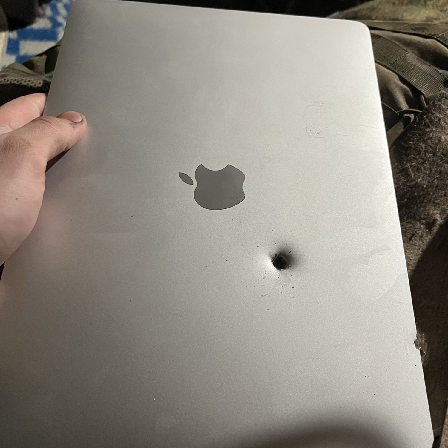 Apple MacBook Air reportedly stops artillery shell fragment for Ukrainian soldier and damaged display inactive  partially working