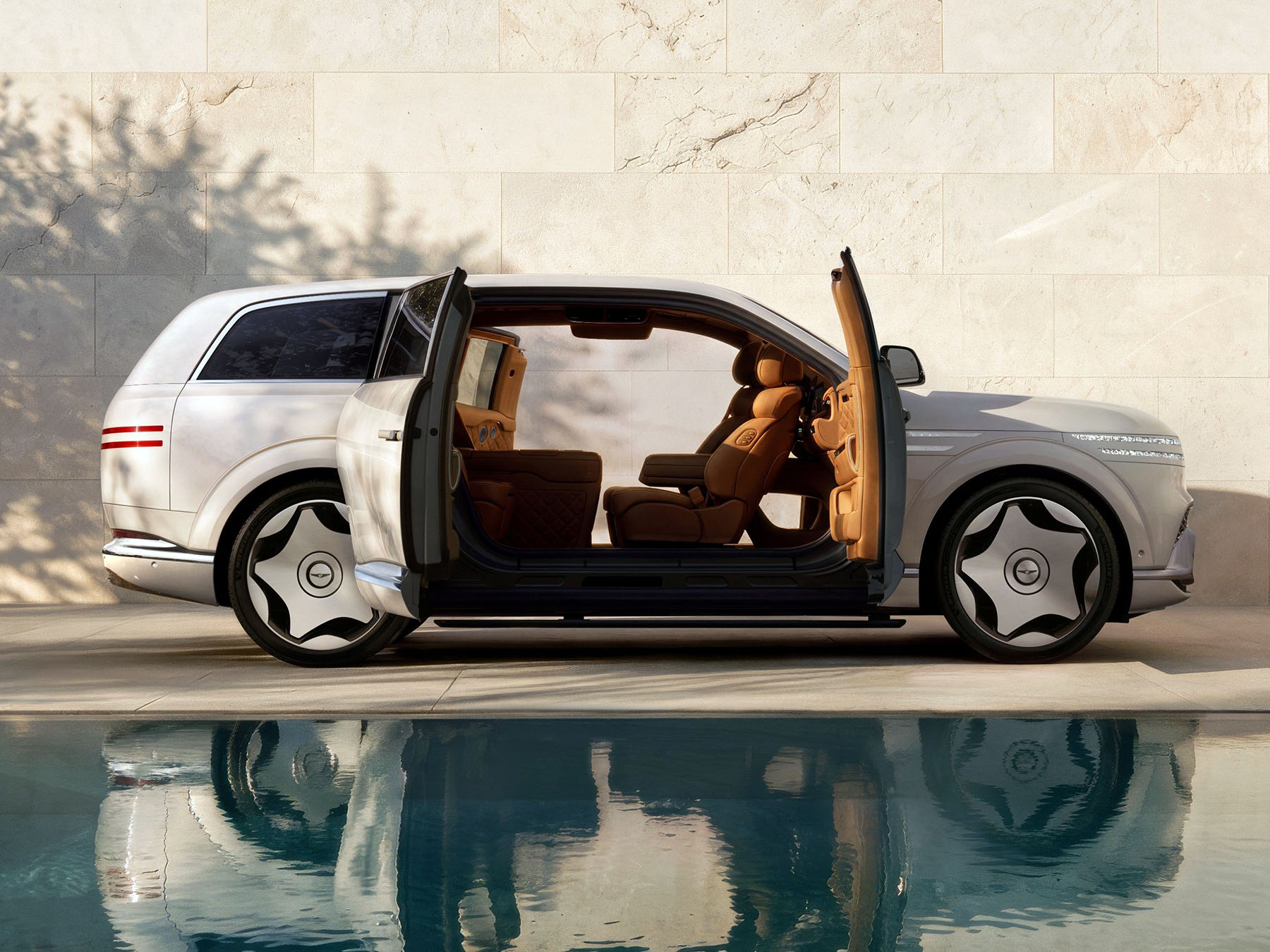 Rodzinny SUV Genesis GV90 debiutuje z pierwszą poduszką powietrzną w dachu oraz drzwiami typu „coach doors” rodem z filmów science fiction
