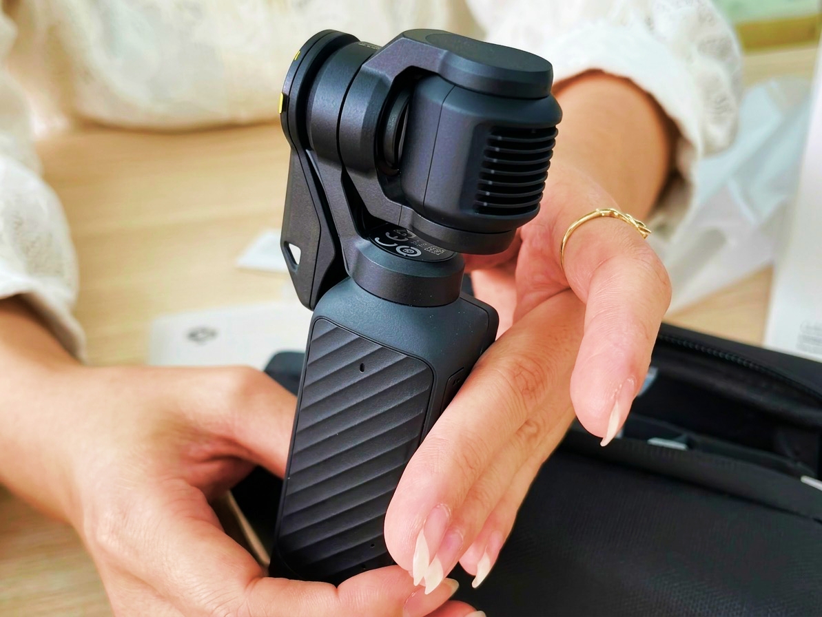 DJI Osmo Pocket 4 - nowe przyciski i magnesy bliżej: Płynniejszy zoom, niestandardowe elementy sterujące