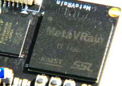 Chip MetaVRain jest mniejszy niż zwykła moneta. (Źródło obrazu: YouTube) 
