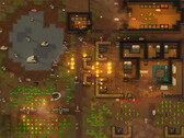 Zrzut ekranu z rozgrywki w RimWorld przedstawiający atakowaną kolonię, z pożarami, zwierzętami i budynkami.
