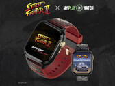 Zegarek gamingowy Street Fighter II: My Play Watch z czerwonym paskiem, detalami w złotym wykończeniu i drugim wyświetlaczem zegarka, na ciemnym tle o wyraźnej fakturze.