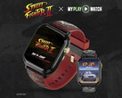 Zegarek gamingowy Street Fighter II: My Play Watch z czerwonym paskiem, detalami w złotym wykończeniu i drugim wyświetlaczem zegarka, na ciemnym tle o wyraźnej fakturze.