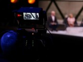 Zdjęcie aparatu fotograficznego filmującego wywiad 