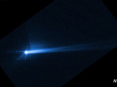 Zdjęcie przedstawiające szczątki wyrzucone z powierzchni Dimorpho po celowym uderzeniu przez sondę kosmiczną DART NASA (źródło zdjęcia: NASA, ESA, STScI i Hubble; przycięte)