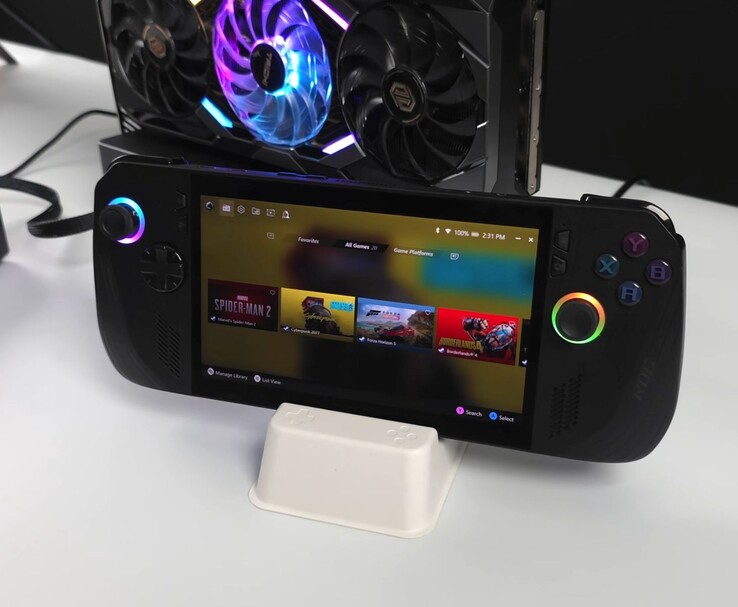 Asus ROG Ally X podłączony do karty graficznej AMD Radeon RX 9070 XT w zewnętrznej stacji dokującej Oculink eGPU, wyświetlającej na ekranie gry takie jak Spider-Man 2, Cyberpunk 2077, Forza Horizon 5 i Borderlands 4 (źródło obrazu: ETA PRIME via YouTube)