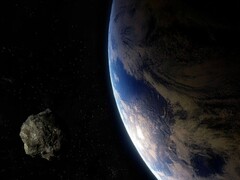 Ilustracja artysty przedstawiająca asteroidę i Ziemię. (Źródło obrazu: Batman111 - Pixabay)