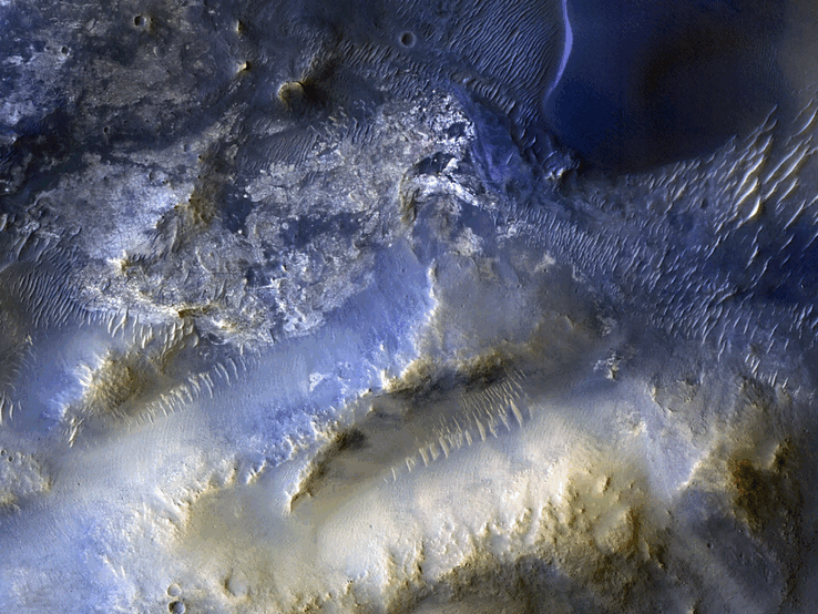 Stutysięczne zdjęcie zarejestrowane przez sondę NASA Mars Reconnaissance Orbiter - widok regionu zwanego Syrtis Major (źródło zdjęcia: NASA, JPL-Caltech i University of Arizona; edytowane)