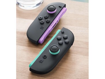 Nowe Joy-Cony mają jasnofioletowe i jasnozielone akcenty na szynach i joystickach. (Źródło obrazu: Nintendo)