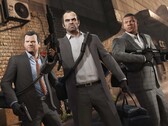 Główni bohaterowie Grand Theft Auto V: Michael, Trevor i Franklin podczas misji napadu z bronią i torbami. (Źródło obrazu: Rockstar Games)