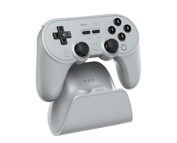 8BitDo Pro 3 jest dostarczany ze stacją ładującą, w której znajduje się adapter 2,4 GHz. (Źródło obrazu: 8BitDo)