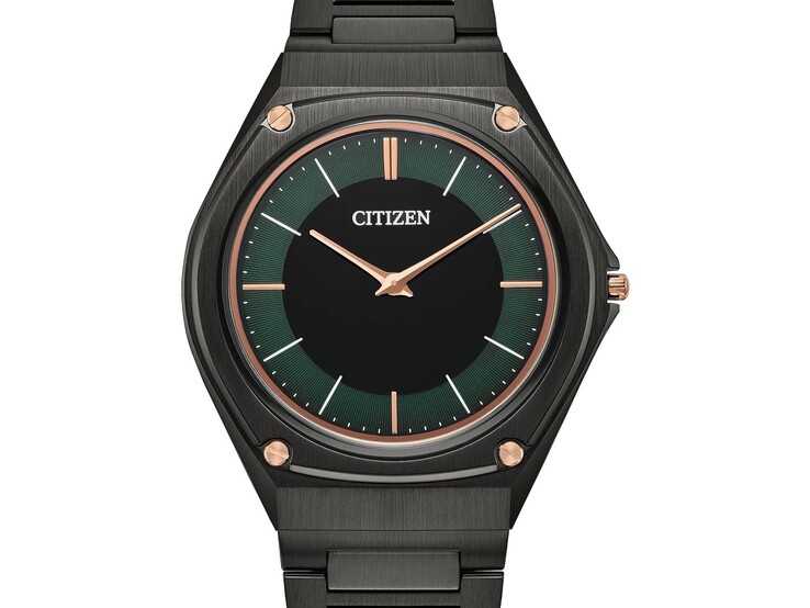 Model AR5065-54W charakteryzuje się efektowną tarczą w kolorze leśnej zieleni z czarnym środkiem oraz wskazówkami, znacznikami i śrubami na ramce w odcieniu różowego złota.