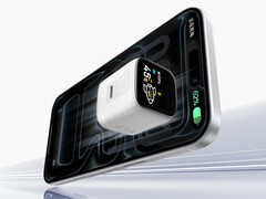 Zasilacz posiada tryb „wydajnościowy” o mocy 60 W. Na zdjęciu: promocyjna wizualizacja szybkiej ładowarki z telefonem iPhone.