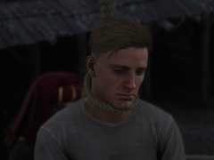 Zrzut ekranu przedstawiający powieszenie Sir Hansa Capona w Kingdom Come Deliverance 2