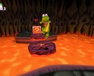Croc Legend of the Gobbos - zrzut ekranu przedstawiający Croca przeskakującego nad lawą