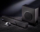Zestaw głośników biurkowych kosztuje w Chinach około 548 dolarów. Na zdjęciu: zdjęcie promocyjne przedstawiające soundbar, głośnik niskotonowy oraz pilot.