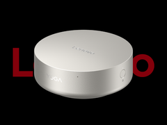 Mini-komputer Lenovo Yoga Mini i, przedstawiony na czarnym tle z logo Lenovo na górze. (Źródło zdjęcia: Lenovo - edytowane)