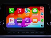 Ekran główny CarPlay z ikonami aplikacji na ekranie dotykowym samochodu marki Kia