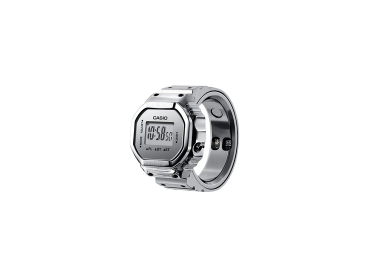 Widok pod kątem srebrnego inteligentnego zegarka Casio CRW-H001M-8 w formie pierścienia, przedstawiający cyfrowy wyświetlacz oraz czujniki zdrowia umieszczone wewnątrz pierścienia.