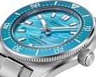 Zbliżenie na zegarek Seiko Prospex 1965 Heritage Diver, ukazujące niebieską tarczę, wskaźnik daty, świecące wskazówki i znaczniki oraz kopertę ze stali nierdzewnej.