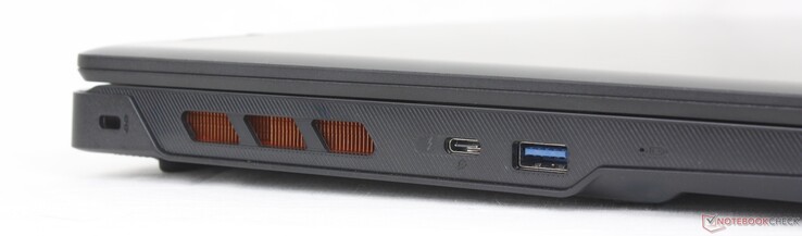 Po lewej: blokada Kensington, USB-C Thunderbolt 4 z DisplayPort 1.4 + Power Delivery, USB-A 3.2 Gen. 1