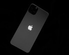 Tył telefonu iPhone z logo Apple na czarnym tle