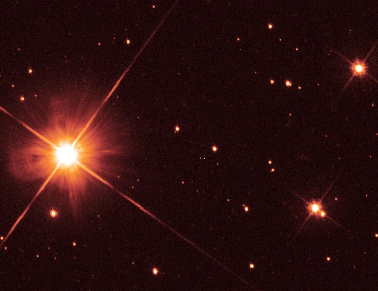 Obraz przedstawiający czerwonego karła Proxima Centauri.