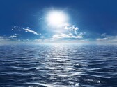 Obraz przedstawiający ocean pod błękitnym niebem. (Źródło zdjęcia: Mathias Weil, Adobe Stock)