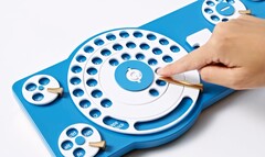 Google Gboard Dial wykorzystuje pokrętło do wybierania znaków. (Źródło obrazu: Google)