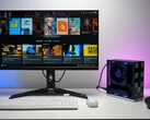 Komputer stacjonarny Framework z systemem operacyjnym Bazzite podłączony do monitora wyświetlającego interfejs gier Steam, przypominający konfigurację konsoli. (ETA PRIME)