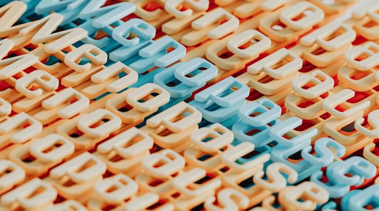 Abstrakcyjne przedstawienie słowa menopauza za pomocą kolorowych liter 3D (źródło obrazu: A.C. via Unsplash)