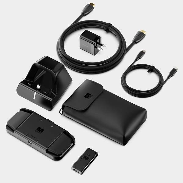 Kontroler MCON jest dostarczany z opcjonalnymi akcesoriami, takimi jak stacja dokująca, ładowarka i klucz HDMI. (Źródło obrazu: Ohsnap)