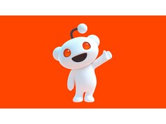 Zdjęcie promocyjne maskotki Reddita, Snoo, machającej do widza i pozującej na czerwonym tle. (Źródło zdjęcia: Reddit)