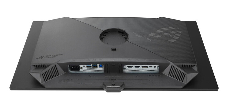 ROG Strix XG27UCDMG ma również inną podstawkę i zewnętrzny zasilacz w porównaniu do ROG Strix PG27UCDM. (Źródło obrazu: Asus)