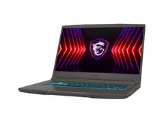 Gamingowy laptop MSI Thin 15 z podświetlaną klawiaturą i logo smoczej tarczy. (Źródło obrazu: MSI)