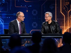 Merz i Huang siedzą na jednym biurku