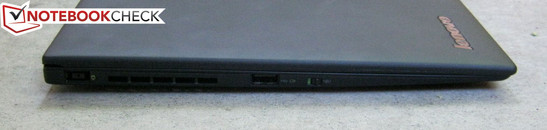 lewy bok: gniazdo zasilania, USB 2.0, przełącznik łączności bezprzewodowej