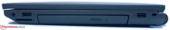 prawy bok: gniazdo audio, czytnik kart pamięci, USB 2.0, napęd optyczny, USB 2.0, gniazdo blokady Kensingtona