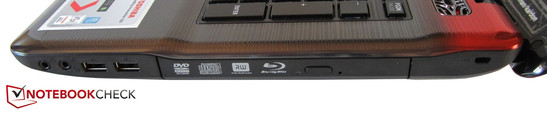 prawy bok: 2 gniazda audio, 2 USB 2.0, napęd optyczny (Blu-ray), blokada Kensingtona