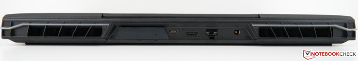 Tył: Gniazdo dla XMG OASIS (z pokrywą), USB-C 3.2 Gen 2×1 (DisplayPort 1.4a), HDMI 2.1 (kompatybilny z G-SYNC, HDCP 2.3), port RJ45 2.5 Gb/s (LAN), zasilacz sieciowy