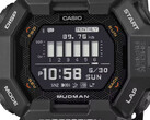 Zegarek Casio G-Shock Mudman GDG-B100 z czerwono-białym wyświetlaczem cyfrowym na tle surowego górskiego krajobrazu.