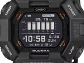 Zegarek Casio G-Shock Mudman GDG-B100 z czerwono-białym wyświetlaczem cyfrowym na tle surowego górskiego krajobrazu.