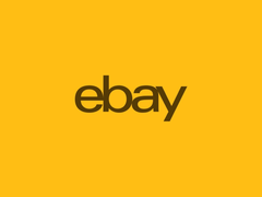 Logo eBay na żółtym tle
