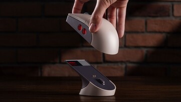 Mysz 8BitDo Retro R8 - N Edition jest dostarczana ze stacją ładującą. (Źródło obrazu: 8BitDo)