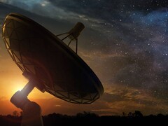 Ilustracja przedstawiająca teleskop skierowany na nocne niebo. (Źródło zdjęcia: Shutterstock / paulista)