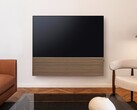 Firma Samsung oferuje telewizor Samsung S99H OLED Smart TV w zestawie ze stylowym soundbarem wyposażonym w drewniany panel przedni.