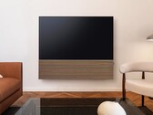 Firma Samsung oferuje telewizor Samsung S99H OLED Smart TV w zestawie ze stylowym soundbarem wyposażonym w drewniany panel przedni.