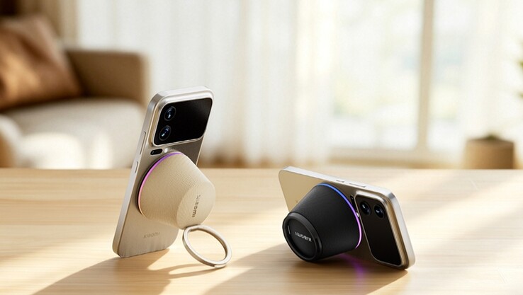 Głośnik Xiaomi przymocowany do telefonu za pomocą pierścienia magnetycznego, pełniący funkcję podstawki pod telefon