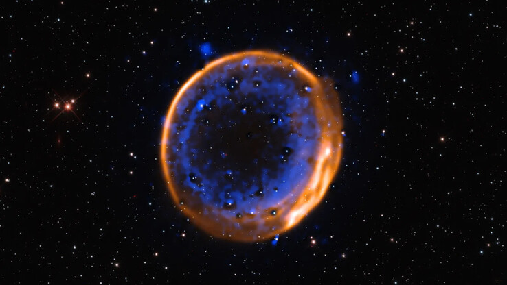 Obraz supernowej z podwójną detonacją SNR 0509-67.5 widziany przez VLT. (Źródło zdjęcia: ESO/P. Das et al. Gwiazdy tła (Hubble): K. Noll et al.)