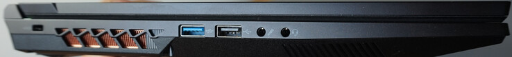 Po lewej: blokada Kensington, USB-A (5 Gbit/s), USB-A (0,5 Gbit/s), mikrofon, zestaw słuchawkowy